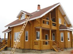 Коттедж из оцилиндрованного бревна КБР-11 (11,40x9,20 м) Коттедж из оцилиндрованного бревна КБР-11 (11,40x9,20 м)