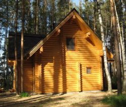 Коттедж из оцилиндрованного бревна КБР-2 (12,2x10,0 м) Коттедж из оцилиндрованного бревна КБР-2 (12,2x10,0 м)